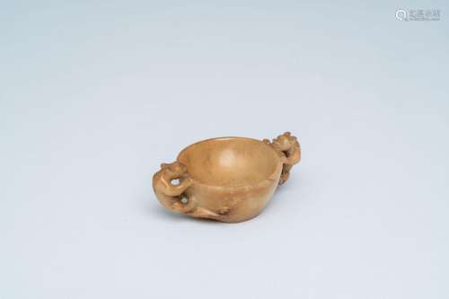 A Chinese jade libation cup with two chilongs as handles, pr...