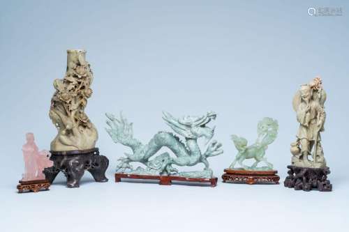 Five Chinese sculptures in jade, pink quartz and soapstone, ...