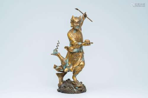 A large Chinese brass 'Kui Xing' figure, 20th C.<br />
H 69 ...