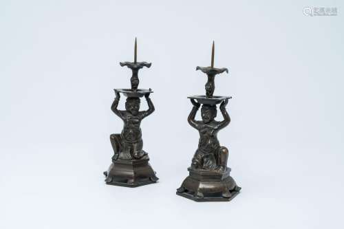 A pair of Chinese bronze candlesticks, Qing<br />
H 25,5 - 2...