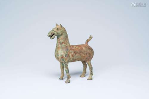 A Chinese Han style bronze model of a horse, 20th C.<br />
H...