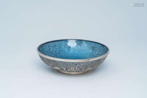 A Chinese or Vietnamese reticulated silver bowl with blue gl...