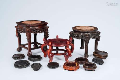 A varied collection of Chinese wood stands, 20th C.<br />
Va...