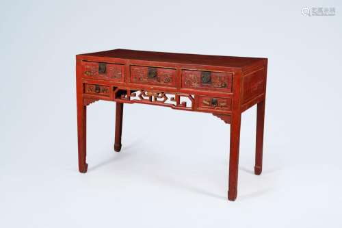 A Chinese red-lacquered and partly gilded wooden side table ...