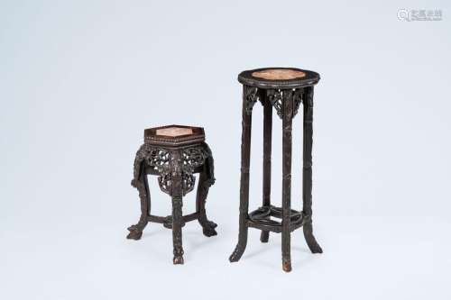 Two Chinese open worked carved wood stands with marble top, ...