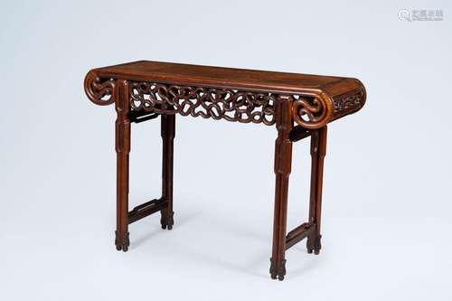 A Chinese carved wood altar table with burl wood top, 20th C...