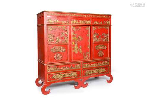 A Chinese partly gilded red-lacquered cabinet, ex-collection...