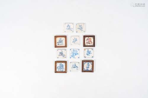 11 blue and white and polychrome Dutch Delft tiles with hors...