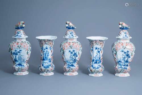 A large Dutch Delft polychrome five-piece garniture with flo...