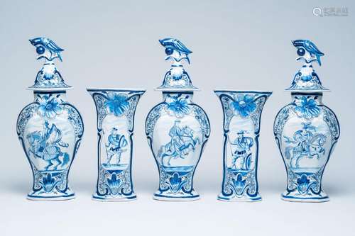 A Dutch Delft blue and white five-piece garniture with soldi...