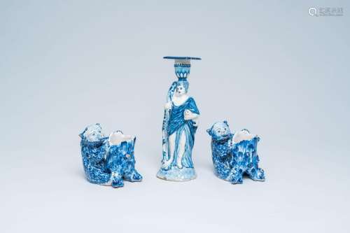 A Delft style blue and white 'muse' candlestick and two matc...