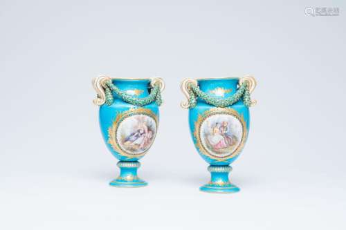 A pair of French gold layered turquoise ground vases with ga...