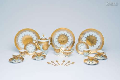 An eighteen-piece German gilt porcelain service with a galla...