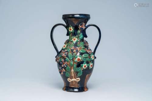 A large two-handled Flemish pottery Art Nouveau ewer with ap...