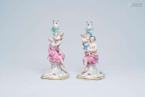 A pair of German polychrome and gilt Meissen porcelain candl...