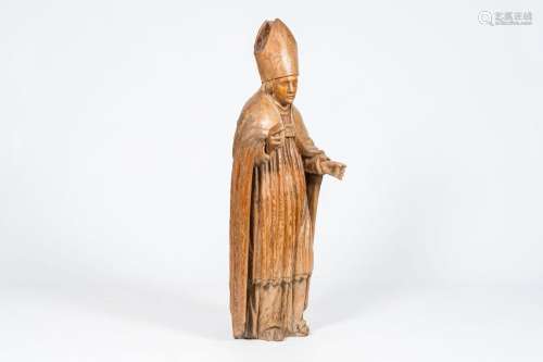 A large carved oak figure of a bishop, 17th/18th C.<br />
H ...