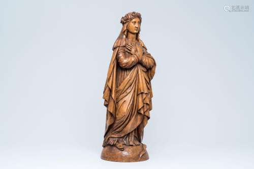 A Symbolist style carved wood Madonna trampling evil in the ...