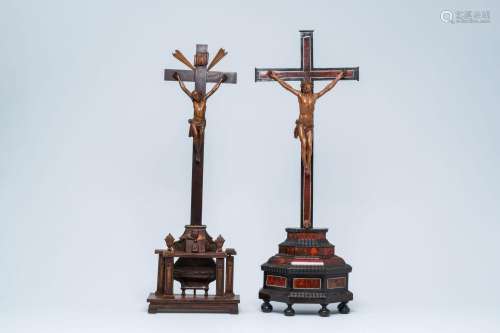 Two Flemish wood Corpi Christi mounted on a crucifix, one cr...