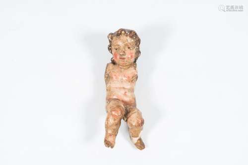 A Flemish carved and polychrome painted wood putto, 17th/18t...