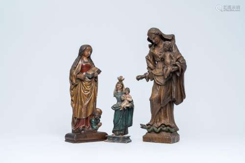 Two wood sculptures of the Madonna with Child and one of Sai...