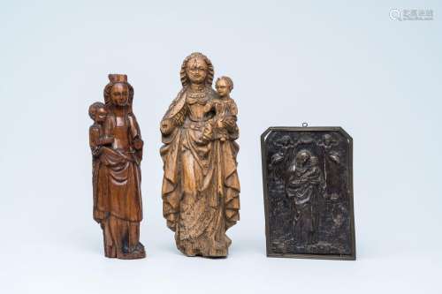 Two wood sculptures and a carved wood plaque of the Madonna ...