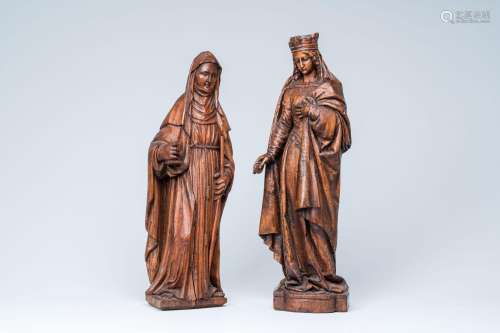 Two wood sculptures of female saints, 17th/18th C.<br />
H 6...