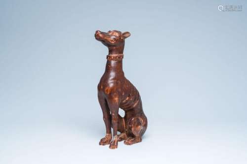 A carved and patinated wood model of a greyhound, 19th/20th ...