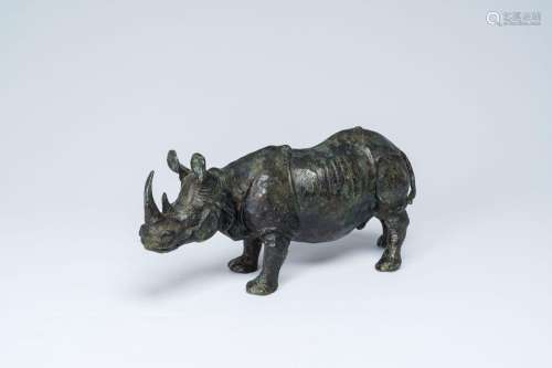 A green patinated bronze model of a rhinoceros, 20th C.<br /...