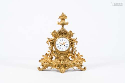 An impressive French gilt bronze mantel clock with floral de...