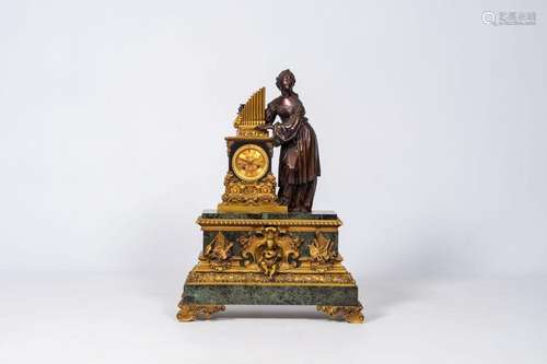 A French patinated and gilt bronze mounted vert de mer marbl...