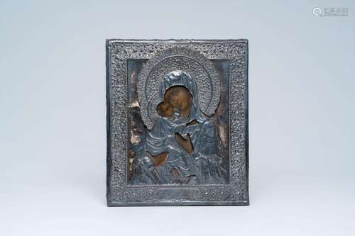 An orthodox 'Mother of God' icon with silver oklad or riza, ...