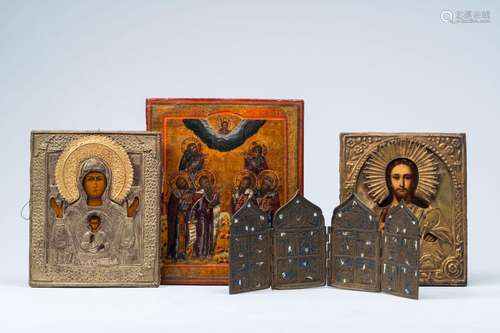 Three various orthodox icons, two of which with oklad or riz...