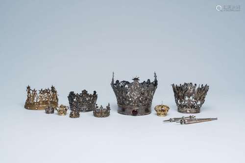 A varied collection of crowns and scepters, a.o. silver and ...