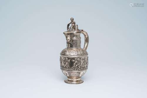 A Dutch historicizing silver jug with a mascaron, dancing pe...