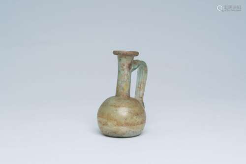 A late Roman pale green glass jug, probably ca. 4th C.<br />...