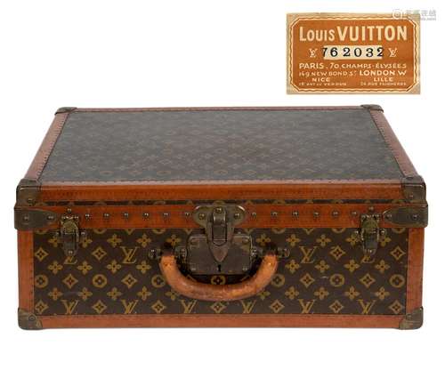 VINTAGE LOUIS VUITTON SUITCASE.