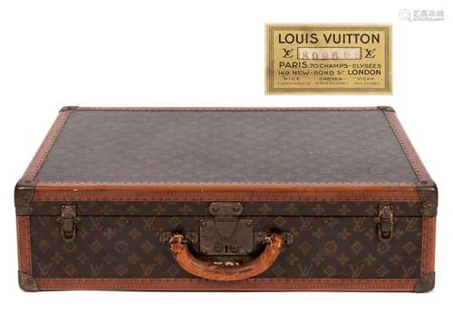 VINTAGE LOUIS VUITTON SUITCASE.