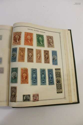 TWO STAMP ALBUMS - THE IDEAL POSTAGE STAMP ALBUM.