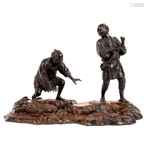 JAPANESE BRONZE FIGURE GROUP & CARVED WOODEN STAND.