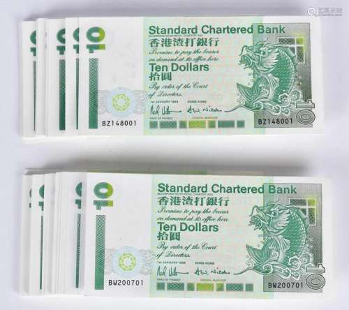 A Group of Standard Chartered Hong Kong Bank Notes