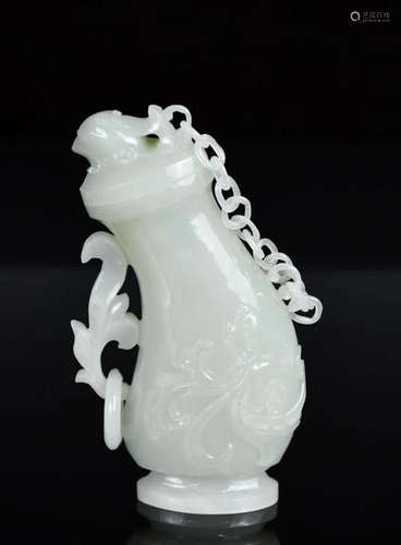 A Carved White Jade Covered Vase Qing