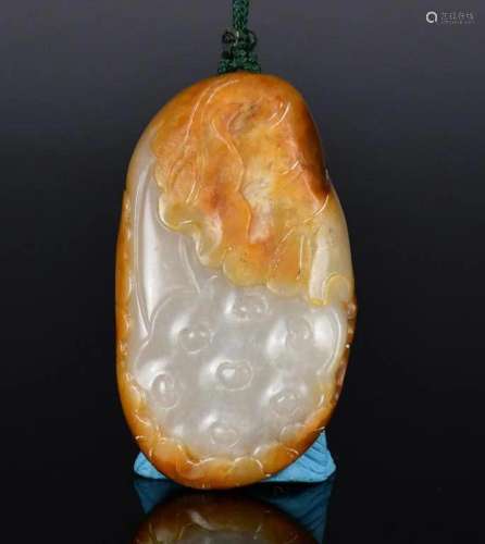 A Celadon Jade Carving