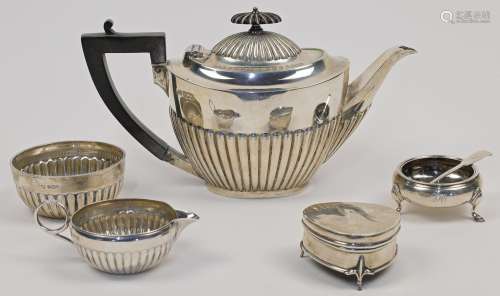 A group of silver, comprising: a Victorian teapot, Sheffield...
