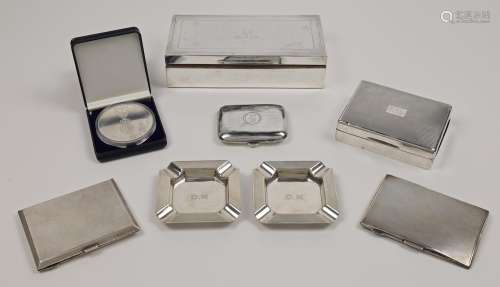 A group of silver, comprising: a large rectangular cigarette...