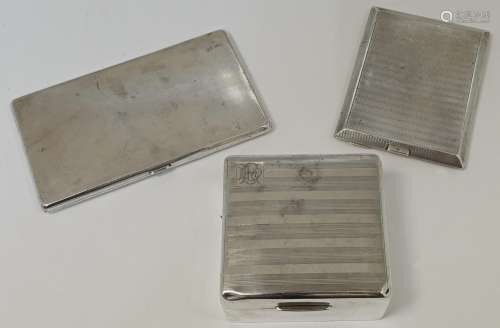 Two silver cigarette cases and a silver cigarette box, compr...
