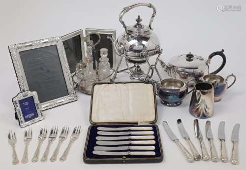 A group of silver plate, to include: a spirit kettle, with s...