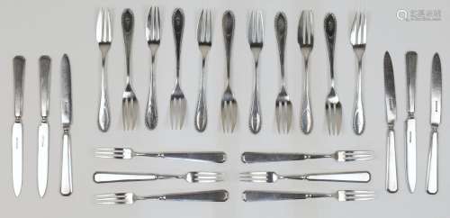 A group of flatware comprising: eleven German pastry forks, ...
