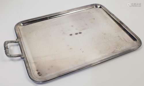 A Christofle silver plated tray, with beaded rim and scrolli...