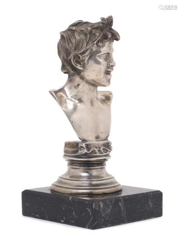 A cast white metal bust of a smiling boy, after Gemito, stam...