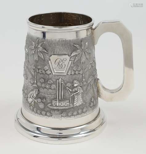 A mug, stamped Sterling, of tapering form on stepped circula...